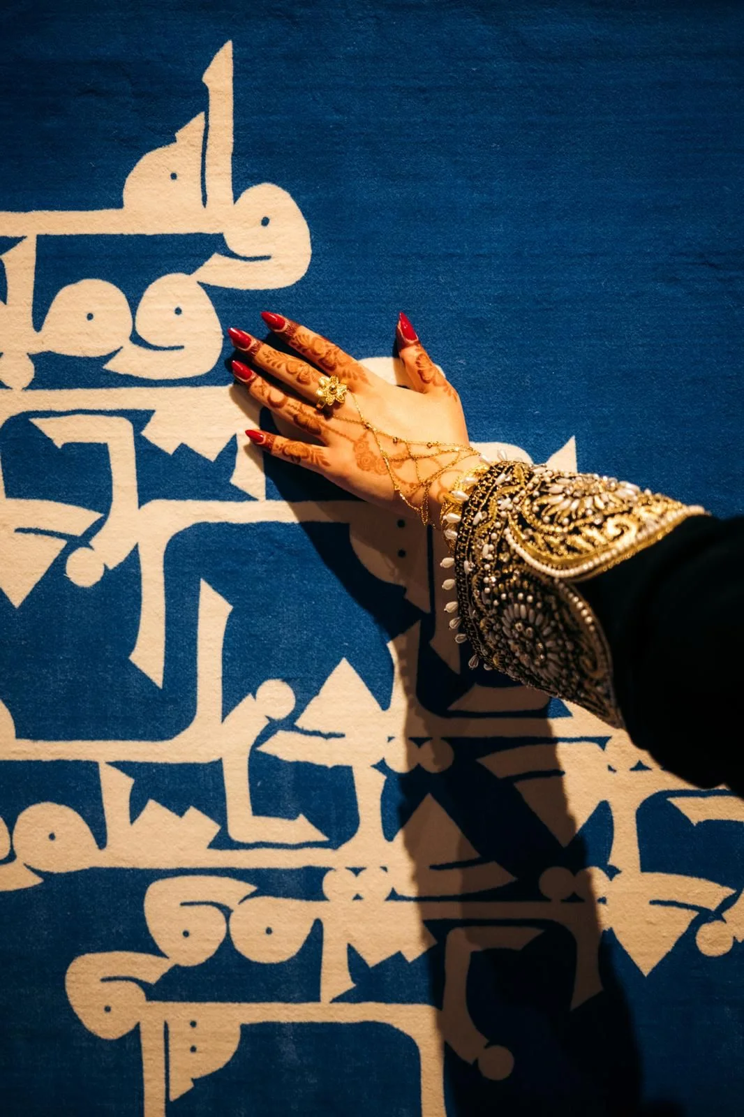 A curator at Alhosh Gallery